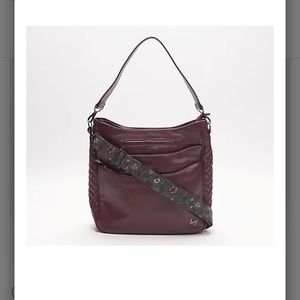 Gorgeous lug purse in a wine color. New with tags!